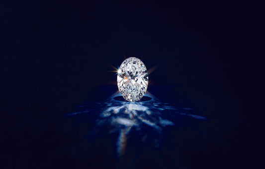 Single Oval Diamond on blue background